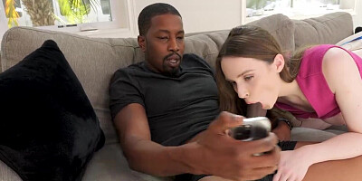 Hazel Moore gives a blowjob to her hunky roommate