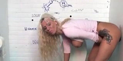 Lady Finds Gloryhole in Public Toilet