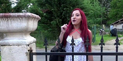 Red-haired hairdresser offers client extra services