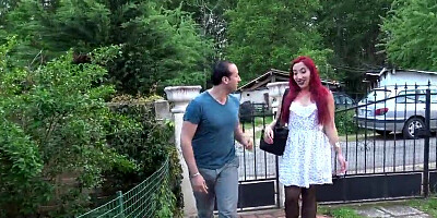 Red-haired hairdresser offers client extra services