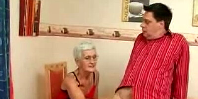 Granny takes her Teeth out for a fine Blow