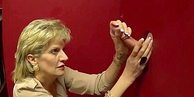 Busty Milf Lady Sonia Milking A Huge Dick On The Gloryhole