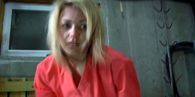 Submissive prisoner strips for maledom