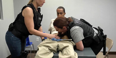 Two female cops are blowing a guy and fucking with him