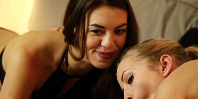 Blonde and brunette playing with selfie stick during FFM 3some
