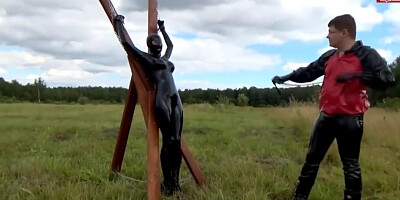 Chained And Used Latex Girl Outdoors