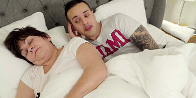Hung boy shares bed with busty mother-in-law