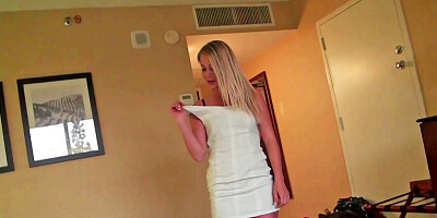 Blonde does a striptease and then she does a blow job
