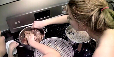 Cindy Hope and Sandy are cooking in the kitchen