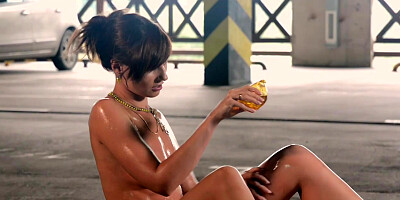 Jeny Smith oiling her naked body in a public parking