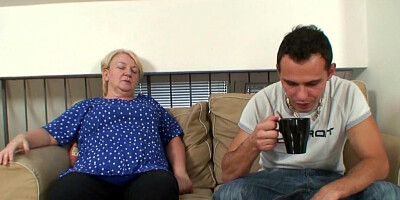 ADrinking coffee and making a move on the younger fella