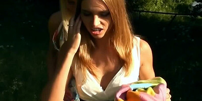 Skinny women are filmed making a picnic together and licking