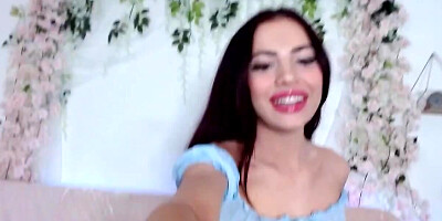 Attractive brunette plays with sex toy in front of webcam