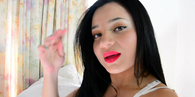 Brunette chick flirts with the camera while sucking a dick