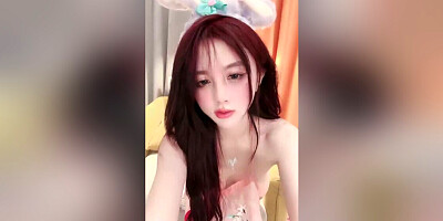asian cutie masturbates