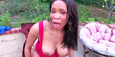 Outstanding ebony doll with huge tits rides on a fat cock outdoors