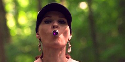 Jeny Smith twerks and teases with her sex toy outside