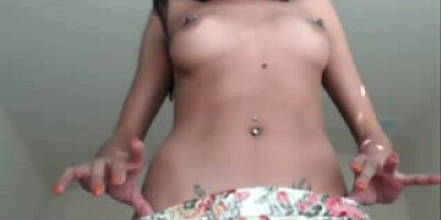 Mixed black chick shakes butt and shaven snatch