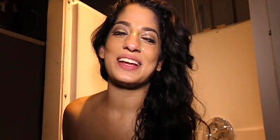 Nadia Ali having fun with black cock in a gloryhole