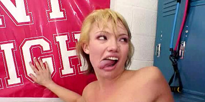 A shy little blonde with short hair is fucking in the locker room