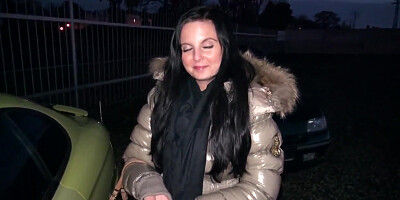 A young girl is offered cash for sex in a lot