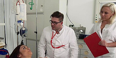 Gynecologist And His Assistant Examine Patients