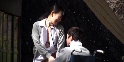 Horny Japanese nurse sucks cock in front of a