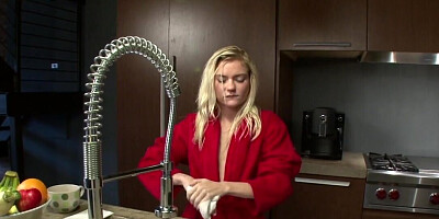 Blondie gets on top of the coutnertop and she masturbates