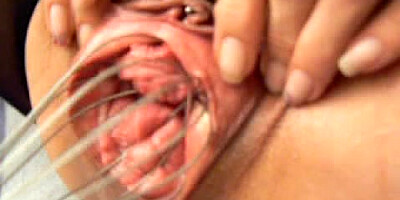 Sex toy video in which a lady is fucked with a whisk