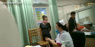 peeping chinese woman to go to the hospital for an injection.1