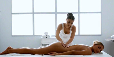 Masseuse pleases her naked customer with lesbian sex