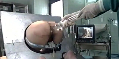Hot milf is a Japanese AV Model in bondage for ass insertion