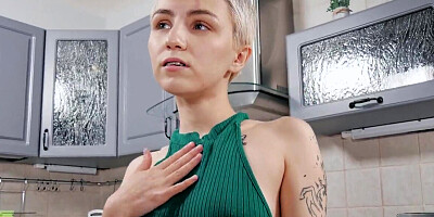 Cute pale blonde with short hair is cumming in the kitchen