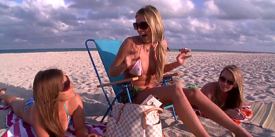 Hot gals hang out on the beach