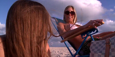 Hot gals hang out on the beach