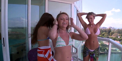 Hot gals hang out on the beach