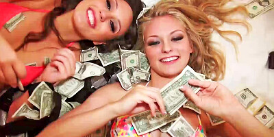 Two girls are having a threesome with a guy