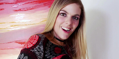 A blonde gives us a sexy smile as she takes a cock in her face