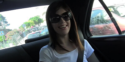 Gorgeous brunette babe gets seduced inside the car
