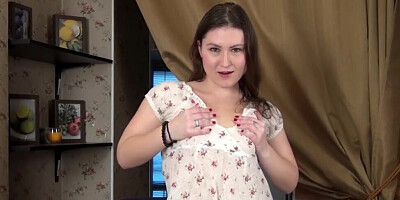 Russian chick with a round face is teasing her tight pussy