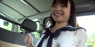 Japanese college girl with big tits gives blowjob in the car
