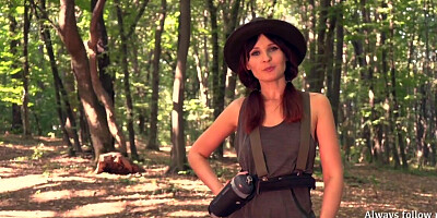 Fully naked Jeny Smith explores the forest to tease you