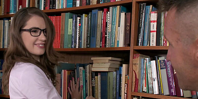 A brunette with glasses is getting fucked in the library today
