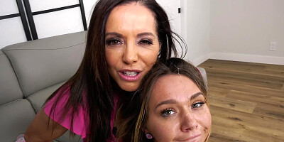 Two juicy girls are sucking hard cock and balls in POV video