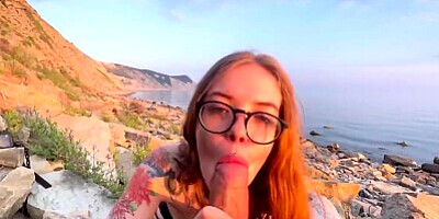 Took her dick in her mouth right on the beach