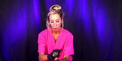 Plastic MILF gives him a very sterile handjob on cam