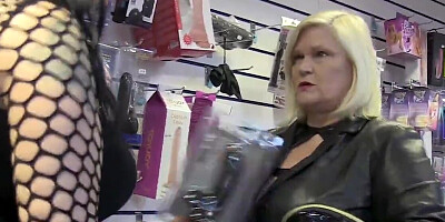 Lesbian matures practice cunnilingus in the sex shop