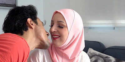 Hot Muslim babe in hijab is getting seduced on a couch