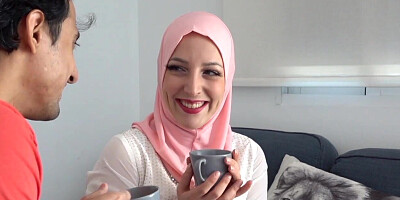 Hot Muslim babe in hijab is getting seduced on a couch