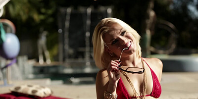 Pure beauty touches her stunning body sunbathing by the pool